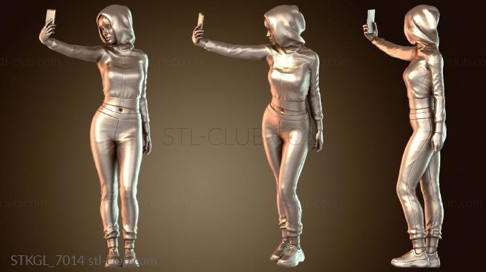 Статуэтки девушки Красивая девушка делает селфи